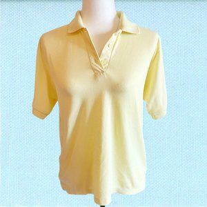 Vintage Lady Footlocker pastel yellow polo shirt